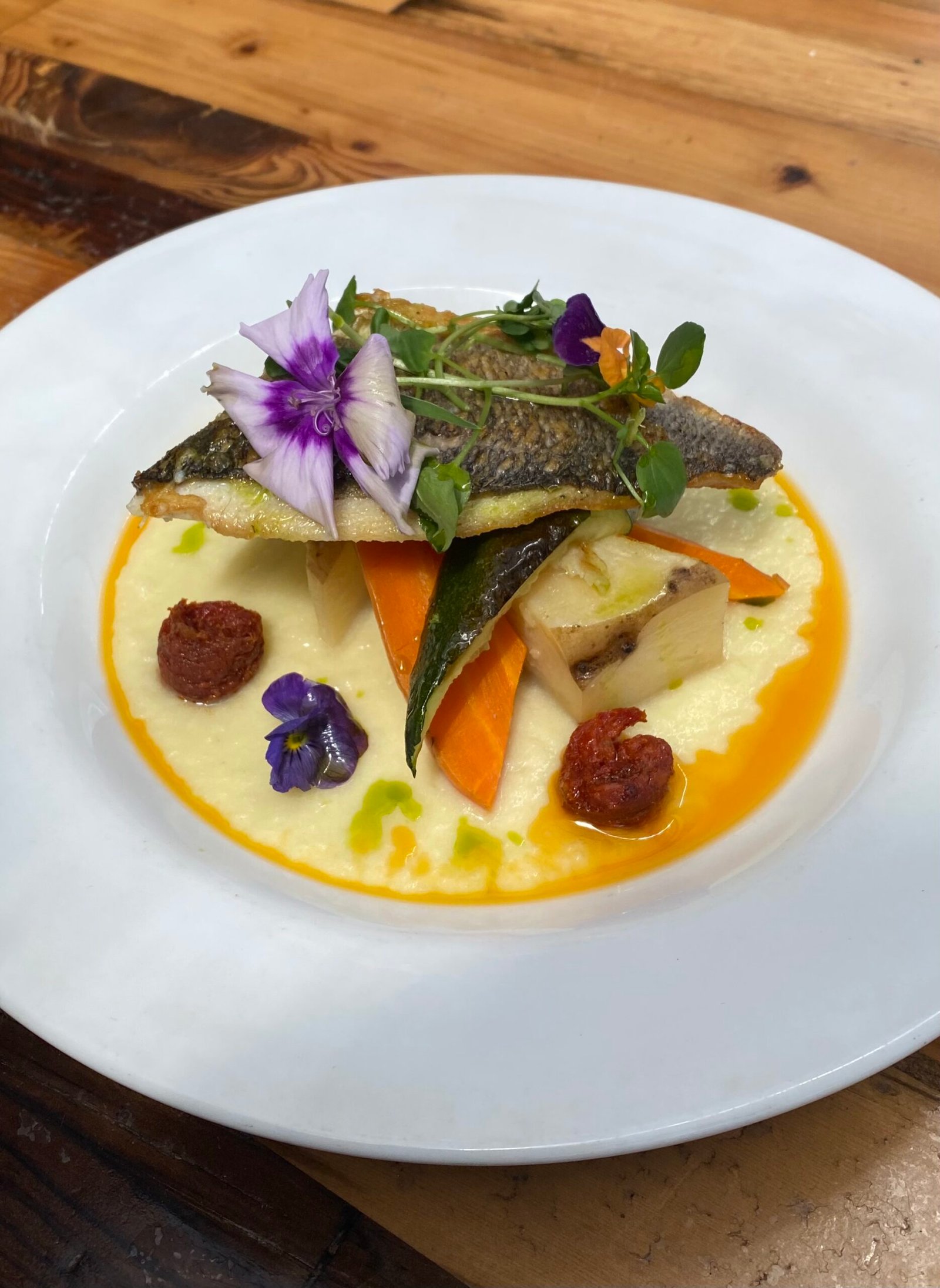 Sea Bream with Confit Potatoes in a Parsnip Puree